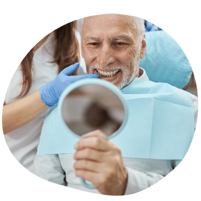Patient smiling after All on Four treatment at Top Dental